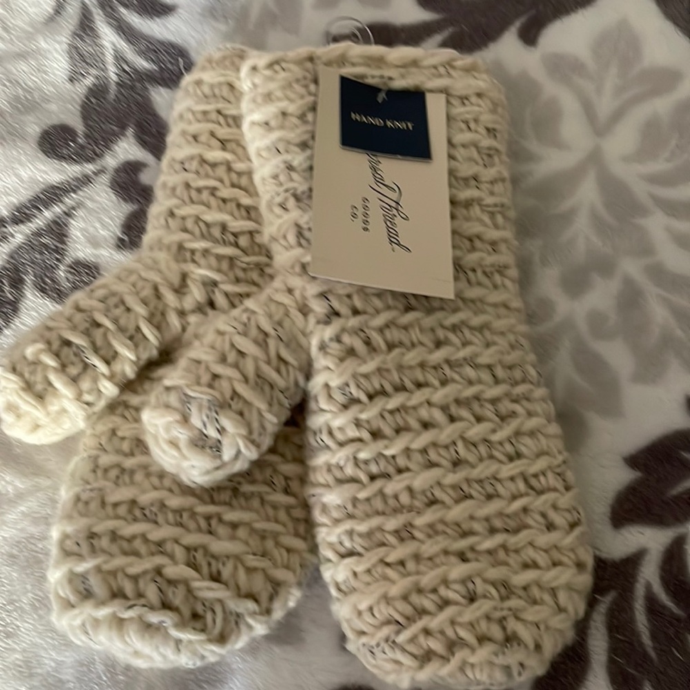 Cream colored gloves